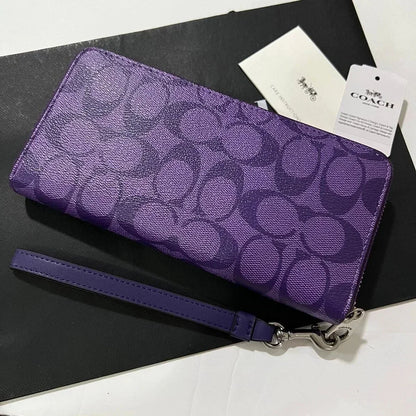 Coach Long Round Zip Wallet with Strap – Purple Signature C4452 – New - Vanrique